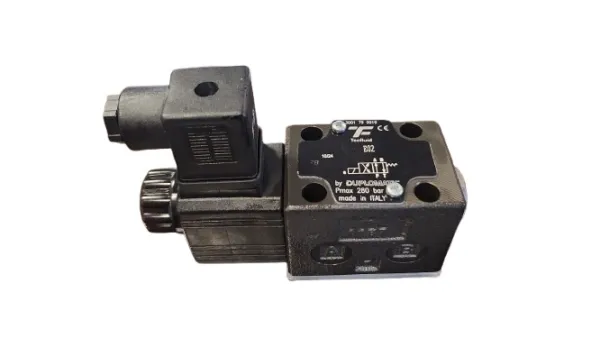 Product X-Trac Power Unit solenoid valve assembly, including solenoid coil and electrical connector. Image